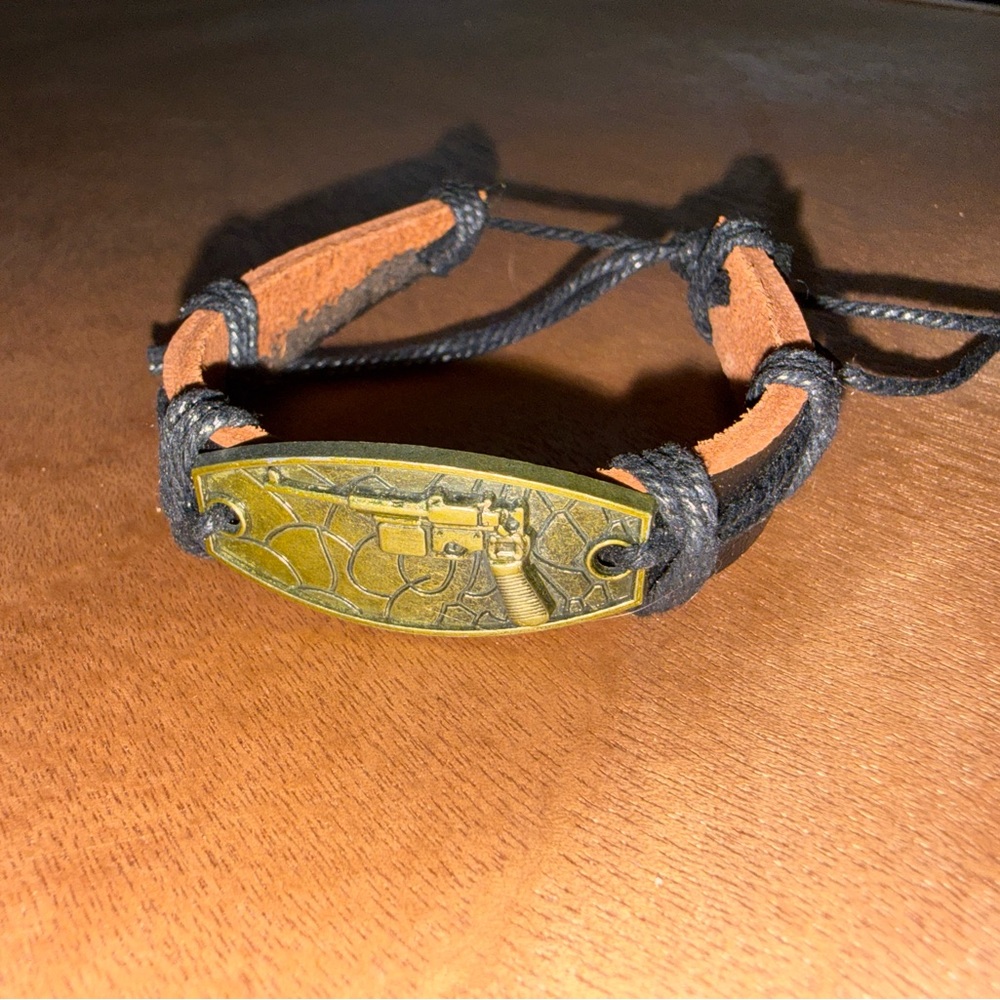 Artisan Black and Gold Leather Bracelet
